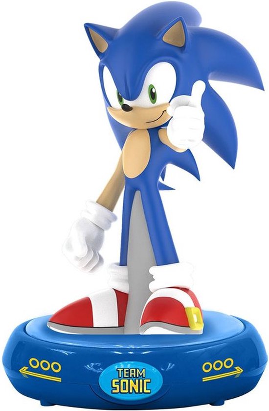 Blauwe Sonic the Hedgehog figuur met witte handschoenen en rode schoenen, staand op een blauw platform met "Team Sonic" logo.