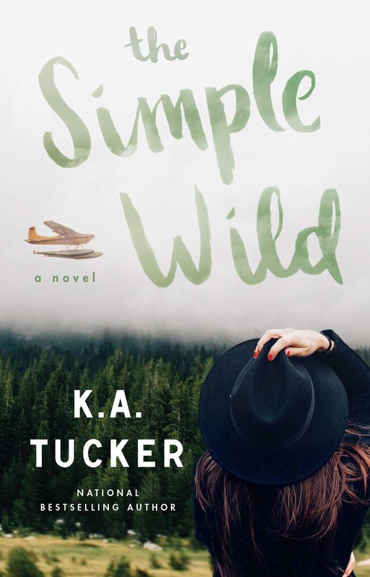 De cover van "The Simple Wild" toont een watervliegtuigje boven een bos, met op de voorgrond een vrouw met een zwarte hoed.