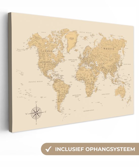 Beige wereldkaart canvas met focus op de linker- en onderkant, met een kompasroos en de tekst 'Inclusief ophangsysteem'.