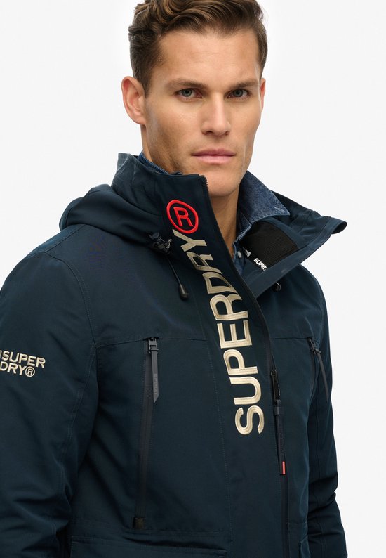 Superdry - Ultimate Windbreaker met capuchon en borduursel - Heren