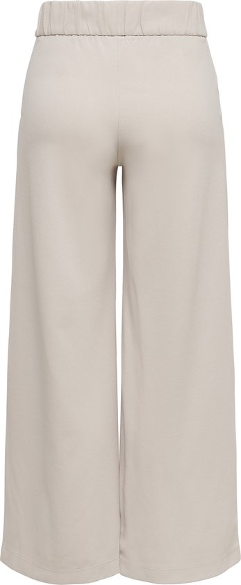 Beige wijde broek met elastische tailleband aan de achterkant.