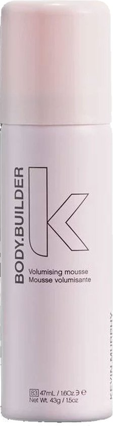 Une mousse volumisante KEVIN.MURPHY BODY.BUILDER dans un petit aérosol rose pastel de 47 ml avec logo K.