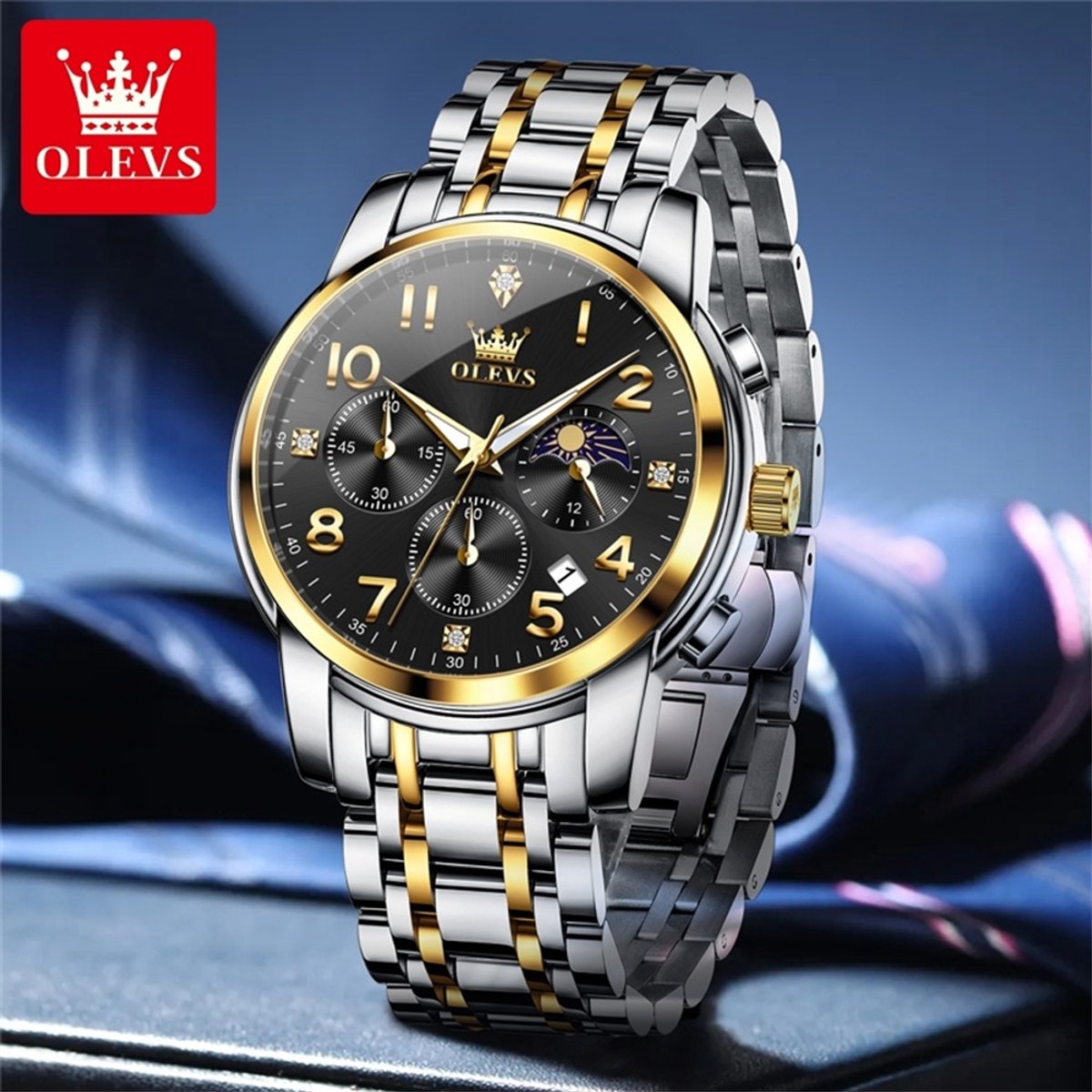 HO-3628.gz-zw : Olevs zilver-goudkl edelstaal horloge, zwarte wijzerplaat, goudkl cijfers, uren minuten maanfase -aanduiding, dagkalender