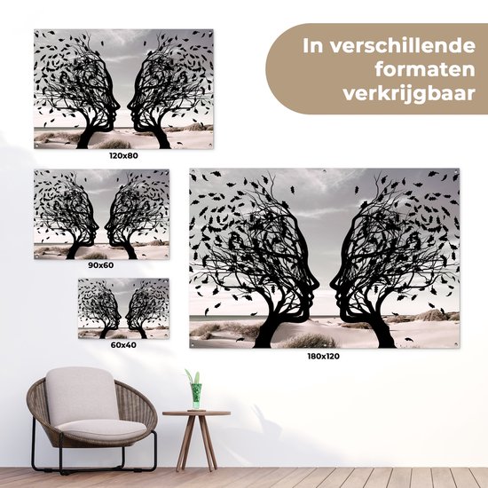 Zwart silhouet van twee bomen met gezichtsprofielen die naar elkaar toe staan, met verschillende formaten.