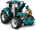 Felgroene tractor met open motorkap, terwijl een minifiguur eraan werkt.
