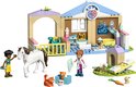 Clinique vétérinaire LEGO Friends avec une vétérinaire, un cheval, des chatons, un chiot, un lapin et des accessoires.