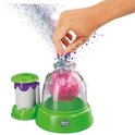 Doctor Squish Squishy Maker machine met een potje, groene basis en paarse dop. Glitter wordt toegevoegd.