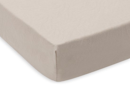 Beige wieglakentje van jersey, zijkant detail.