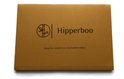Bruine verpakking met het Hipperboo logo en de tekst "Ervaar het verschil van onze bamboe sokken".