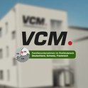 Logo VCM avec le texte "Familienunternehmen im Dreiländereck Deutschland, Schweiz, Frankreich" et une carte du tripoint.