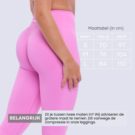 Roze legging, details over maattabel (in cm) en pasvormadvies. Draagster staat met rug naar de camera.