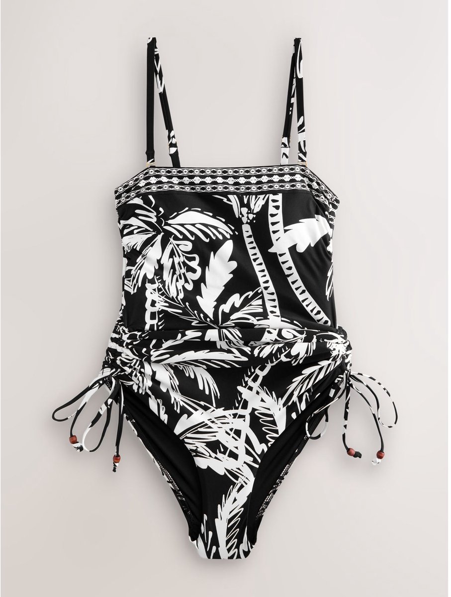 Next Dames - Vormgevend, buikcorrigerend bandeaubadpak met ruches op de pijpen - Zwart Black/Cream Palm