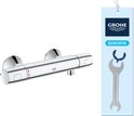 Chroom thermostaatkraan met "Quickfix" en een bijgevoegde sleutel als hanglabel.