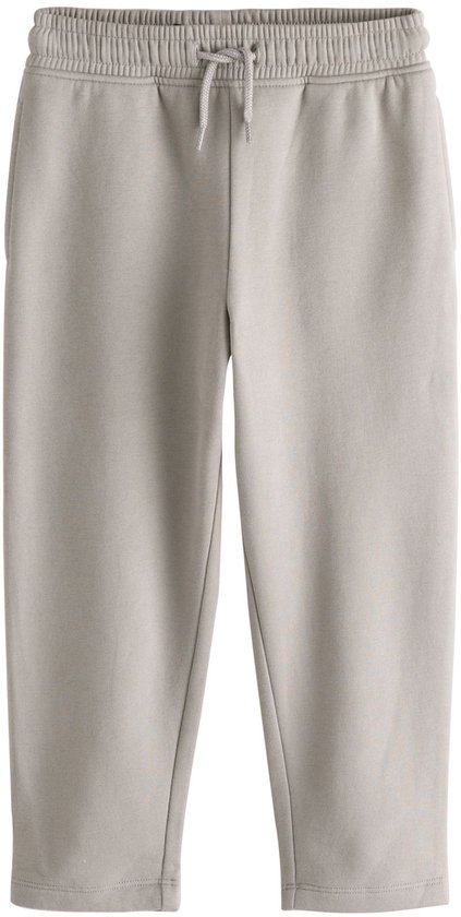 Grijze joggingbroek met elastische tailleband en trekkoord.