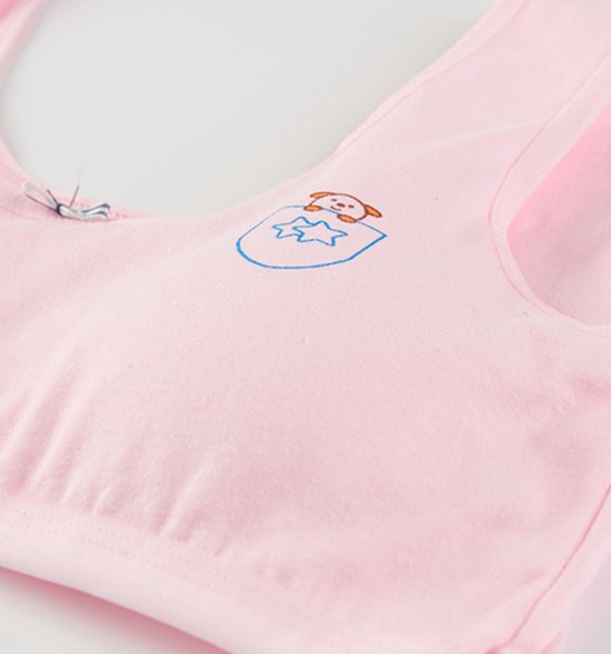 Roze meisjes sportbeha met een geborduurde beer in een borstzakje en een strikje bovenop.