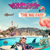 Albumhoes 'The Big Easy' met John Diva en The Rockets of Love, een flamingo, olifant, Mount Rushmore en geld.