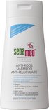 Witte fles Sebamed Anti-Roos Shampoo, 400 ml. '50% minder roos na 14 dagen'.