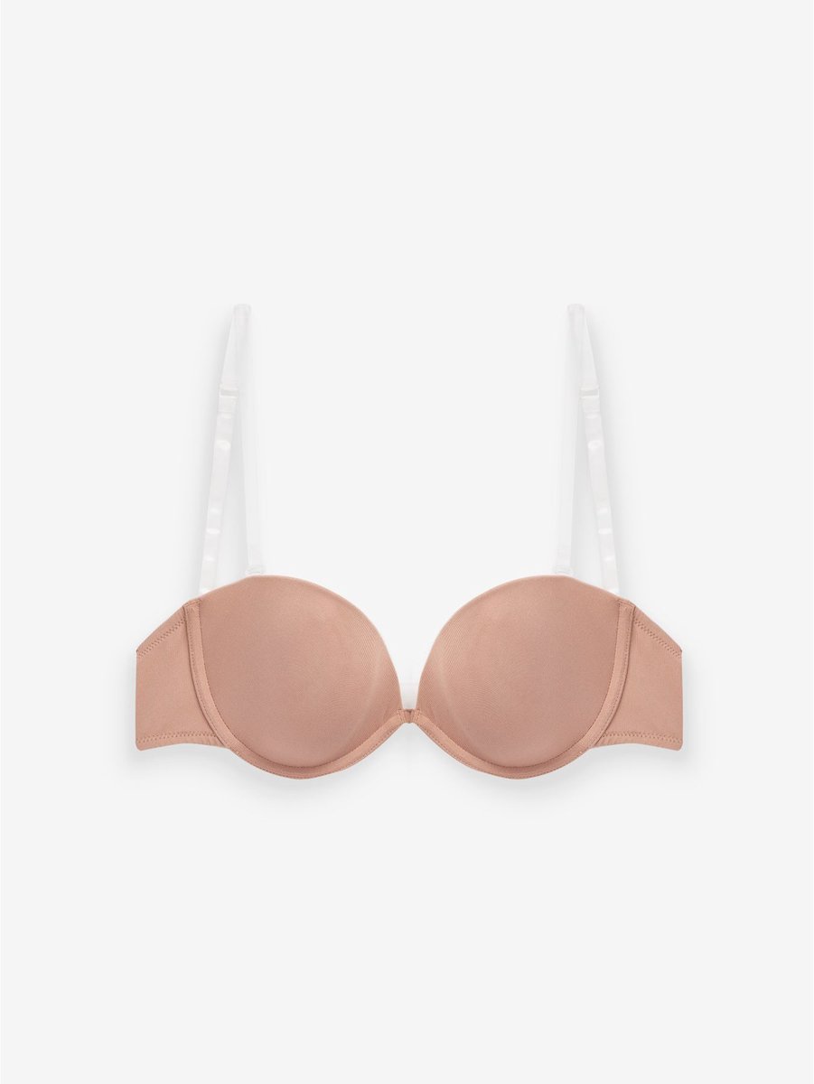 Next Gladmakende strapless en multiway A-E beha met doorzichtige achterkant