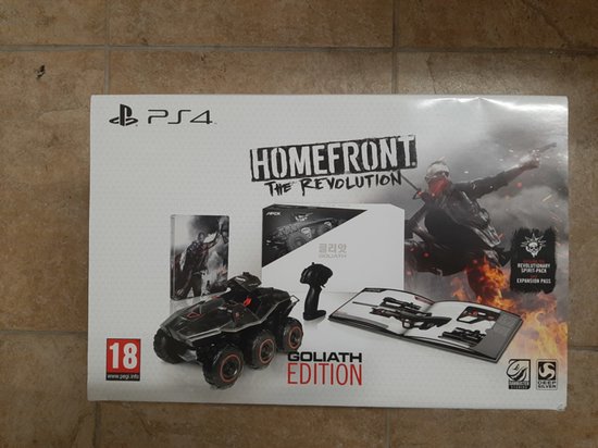 Playstation 4 Homefront The Revolution Goliath Edition met een speelgoedauto, afstandsbediening en boek.