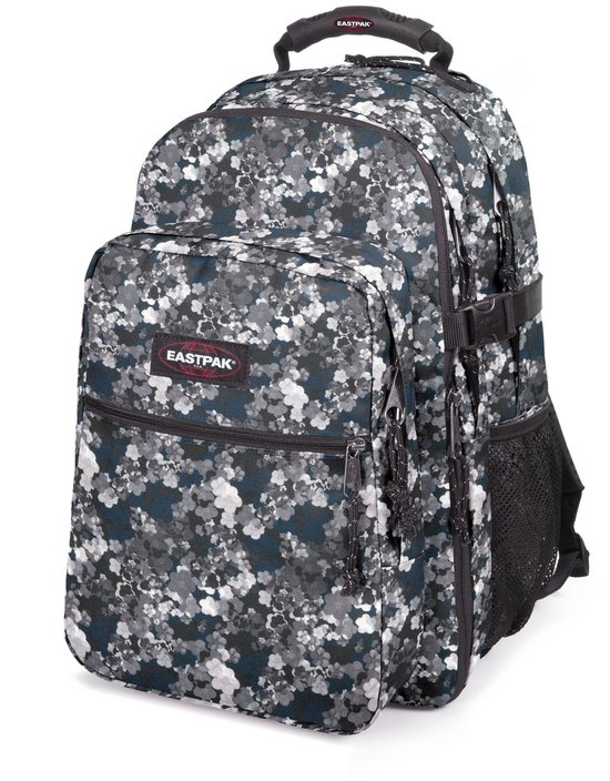 Sac à dos Eastpak à imprimé camouflage gris, blanc et bleu marine.
