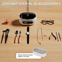 Veelzijdige ultrasone reiniger die verschillende accessoires reinigt, waaronder brillen, sieraden, horloges en make-up kwasten.