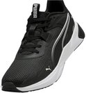 Zwarte PUMA sportschoen met witte zool en witte strepen, Puma-logo op de tong.