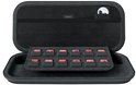 Zwarte beschermhoes voor Nintendo Switch, opengeklapt met vakken voor 12 gamecards en een mesh opbergvak.