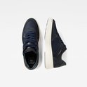 Boven- en zijaanzicht van twee identieke blauwe G-Star Raw sneakers met crèmekleurige zolen.