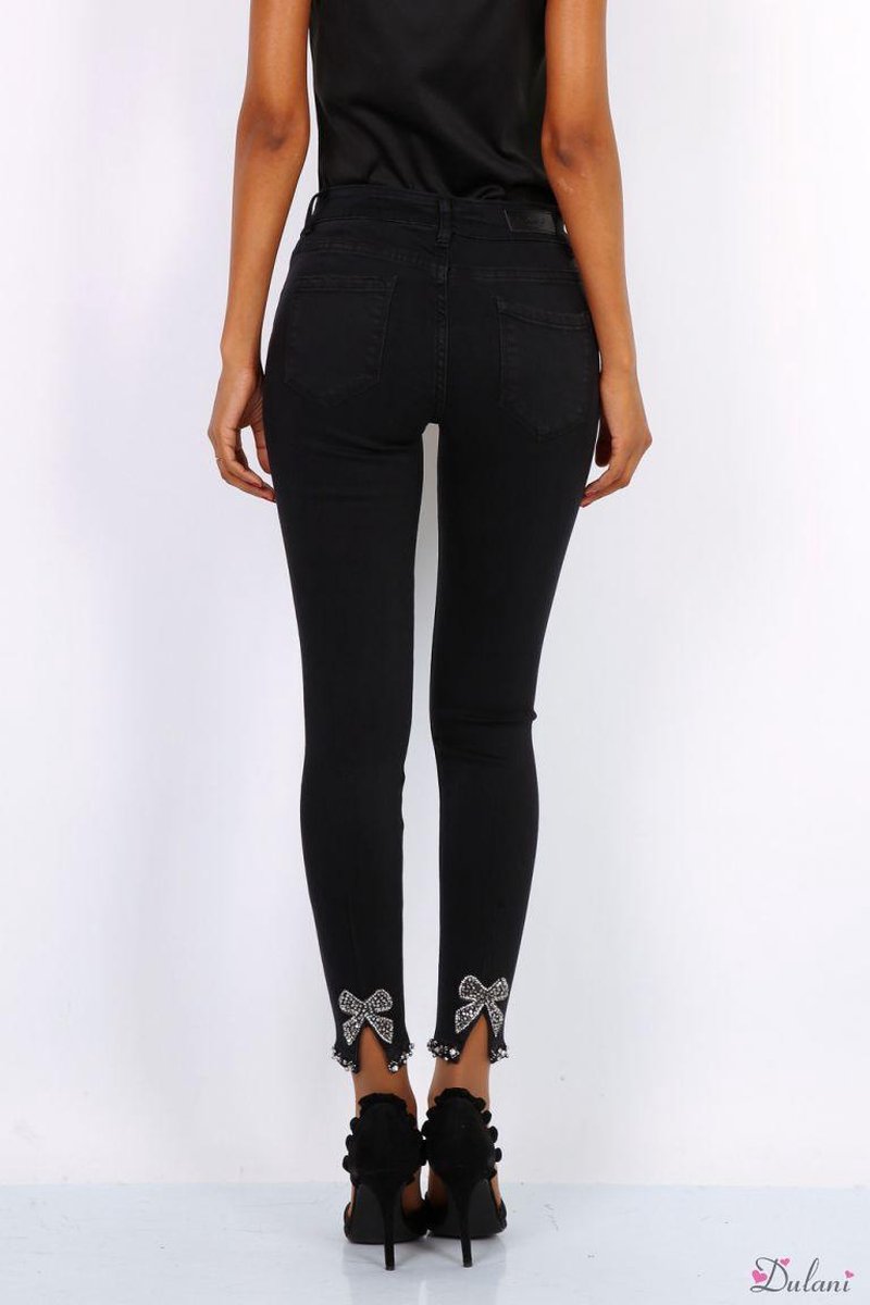 Broek Toxik3 zwart jeans met strikje onderaan normale taille 42 | bol.com