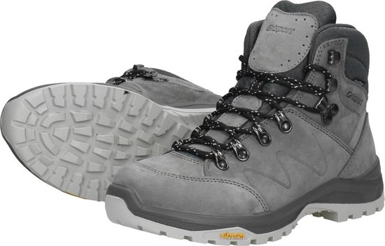 Grijze Grisport wandelschoen met zwarte veters, de zool ligt naast de schoen.