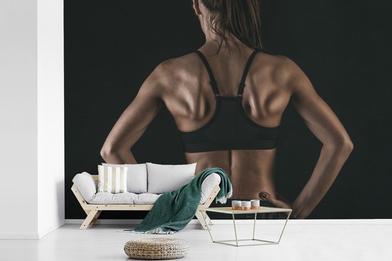Papier peint photo vinyle - Le dos et les épaules d'une femme qui pratique clairement le fitness largeur 390 cm x hauteur 260 cm - Tirage photo sur papier peint (disponible en 7 tailles)