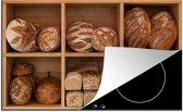 KitchenYeah® Inductie beschermer 80.2x52.2 cm - Verschillende broden gesorteerd in de bakkerij - Kookplaataccessoires - Afdekplaat voor kookplaat - Inductiebeschermer - Inductiemat - Inductieplaat mat