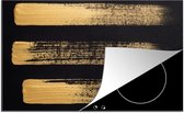KitchenYeah® Inductie beschermer 81x52 cm - Patroon van gouden verf op een zwarte achtergrond - Kookplaataccessoires - Afdekplaat voor kookplaat - Inductiebeschermer - Inductiemat - Inductieplaat mat