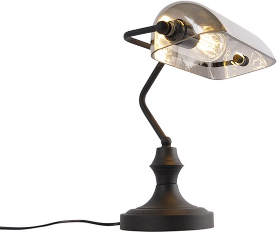 Lampe de bureau classique noire avec abat-jour en verre transparent et bras courbé.