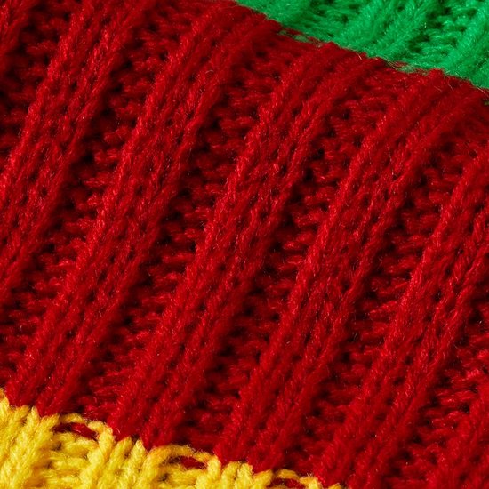 Detail van de ribbelstructuur in rood, geel en groen.
