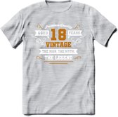 18 Jaar Legend T-Shirt | Goud - Wit | Grappig Verjaardag en Feest Cadeau Shirt | Dames - Heren - Unisex | Tshirt Kleding Kado | - Licht Grijs - Gemaleerd - S