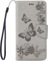 Mobigear Telefoonhoesje geschikt voor Apple iPhone 7 Hoesje | Mobigear Butterfly Bookcase Portemonnee | Pasjeshouder voor 2 Pasjes | Telefoonhoesje voor Pinpas / OV Kaart / Rijbewijs - Grijs