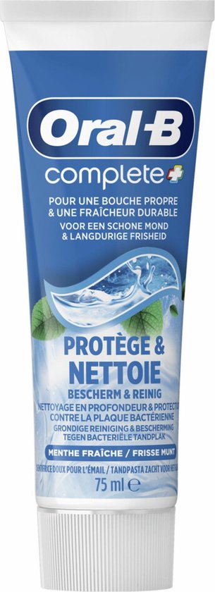 Oral-B Complete tandpastabuis met munten en golven, 'Protège & Nettoie' en 'Bescherm & Reinig'.