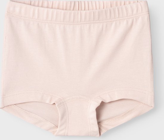 Lichtroze meisjesbroekje met elastische tailleband, op een grijze achtergrond.