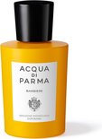 Gele fles met een wit etiket van Acqua di Parma Barbiere, verfrissende aftershave emulsie.