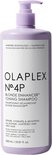 Lichtpaarse fles met pompdispenser, met daarop 'OLAPLEX N°.4P BLONDE ENHANCER TONING SHAMPOO'.