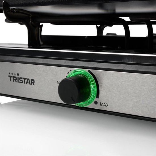 Zilverkleurige Tristar raclette grill met draaiknop en groene illuminatie.