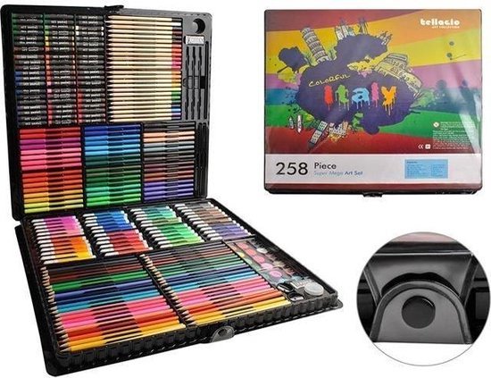 Kunstdoos geopend met kleurpotloden, stiften, verf en gum. Naast de doos de omslag van de set.