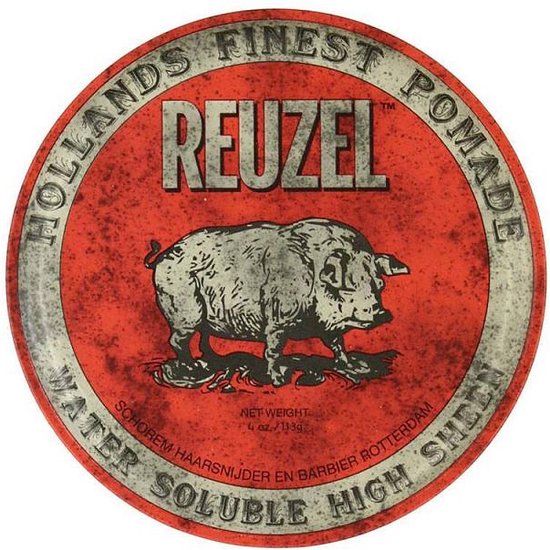 Rood Reuzel pomadeblik met "HOLLANDS FINEST POMADE REUZEL", een varken en "WATER SOLUBLE HIGH SHEEN".