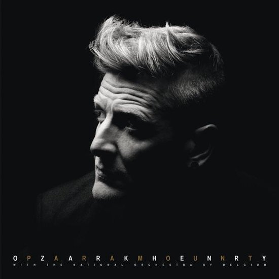 Zwart-wit portret van Glen Hansard, met de tekst 'OP ZARRAMKHOEUNRTY' en 'WITH THE NATIONAL ORCHESTRA OF BELGIUM'.