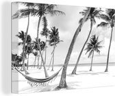 Toile Peinture Hamac entre palmiers sur la plage près de la République Dominicaine - noir et blanc - 60x40 cm - Décoration murale