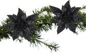 Kerstboom bloemen op clip -2x stuks - zwart glitter -kunststof - 15 cm