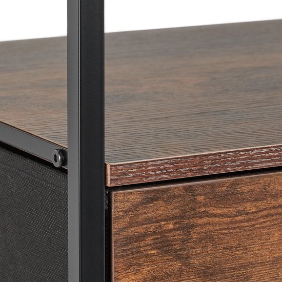 Detail van het houten blad en metalen frame van een nachtkastje met lade.