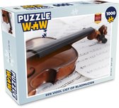 Puzzel Een viool ligt op bladmuziek - Legpuzzel - Puzzel 1000 stukjes volwassenen