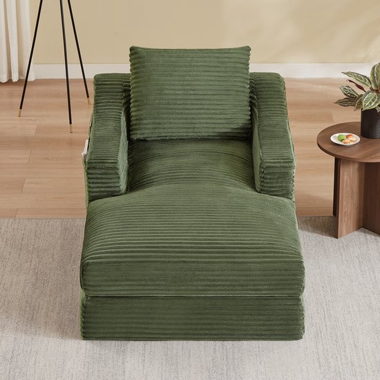Groene corduroy fauteuil met uitklapbaar bed, van bovenaf gezien.